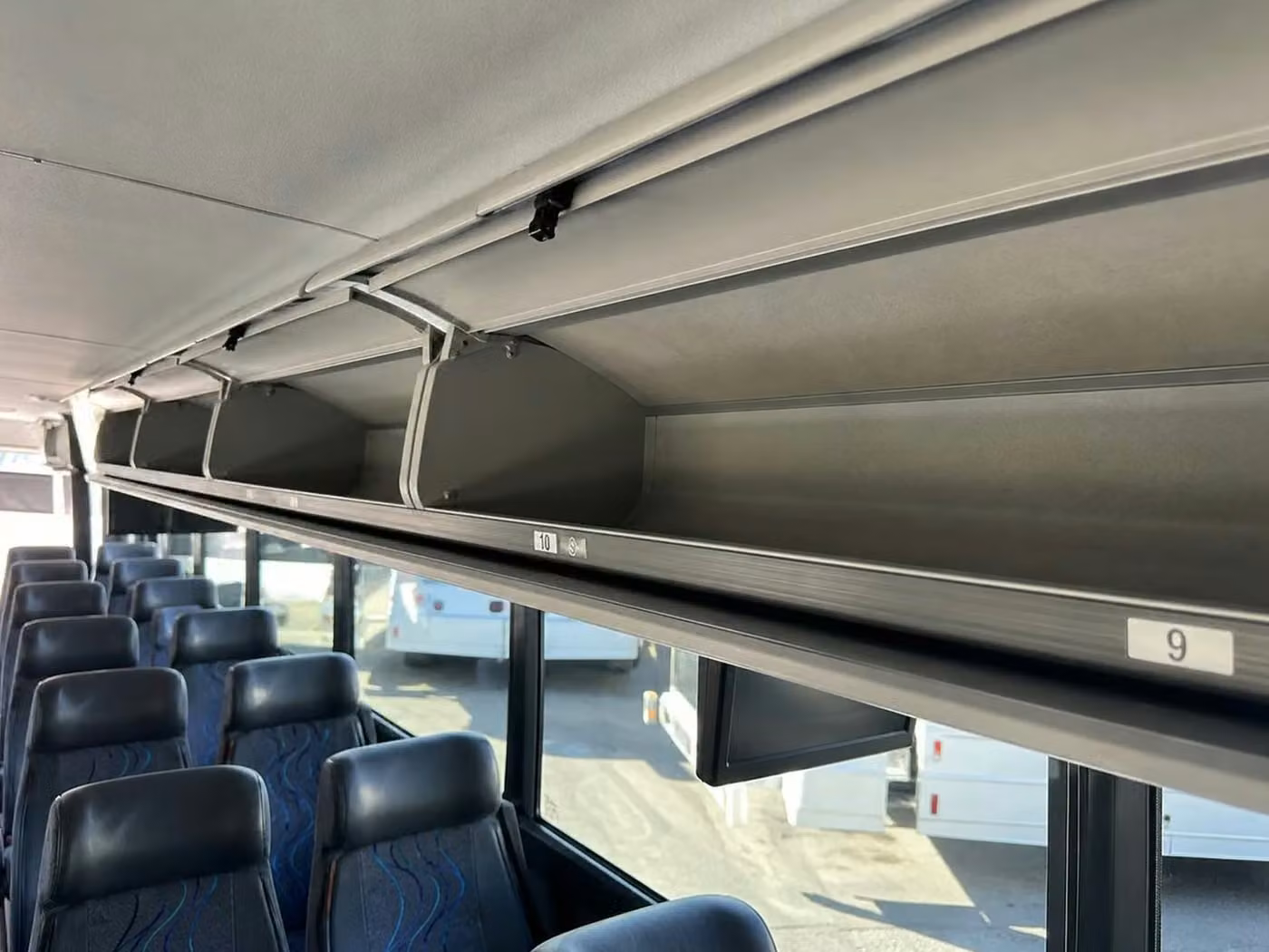 bell gardens charter bus overhead storage